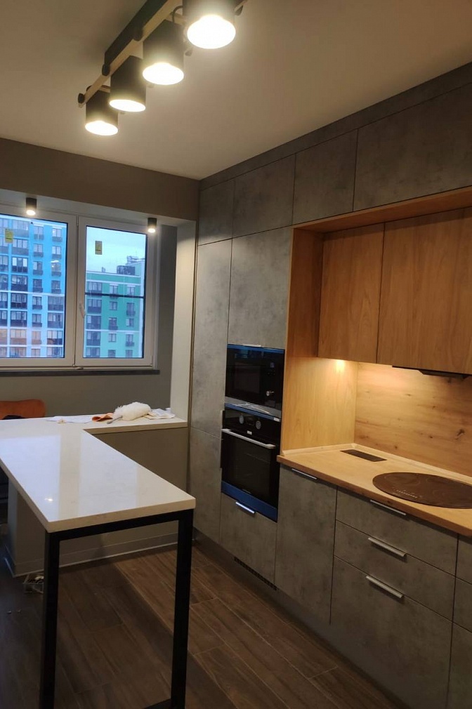 Трендовое сочетание для кухни: бетон + дерево